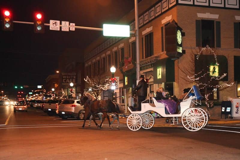 Home for the Holidays Carriage rides down street