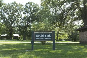 Goold Park sign in Morris, summertime greenery.