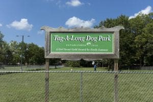 Tag-A-Long Dog Park entrance sign, established 2016.