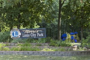 Morris Lions City Park entrance sign with playground